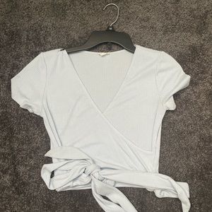 Garage size medium light blue crop top